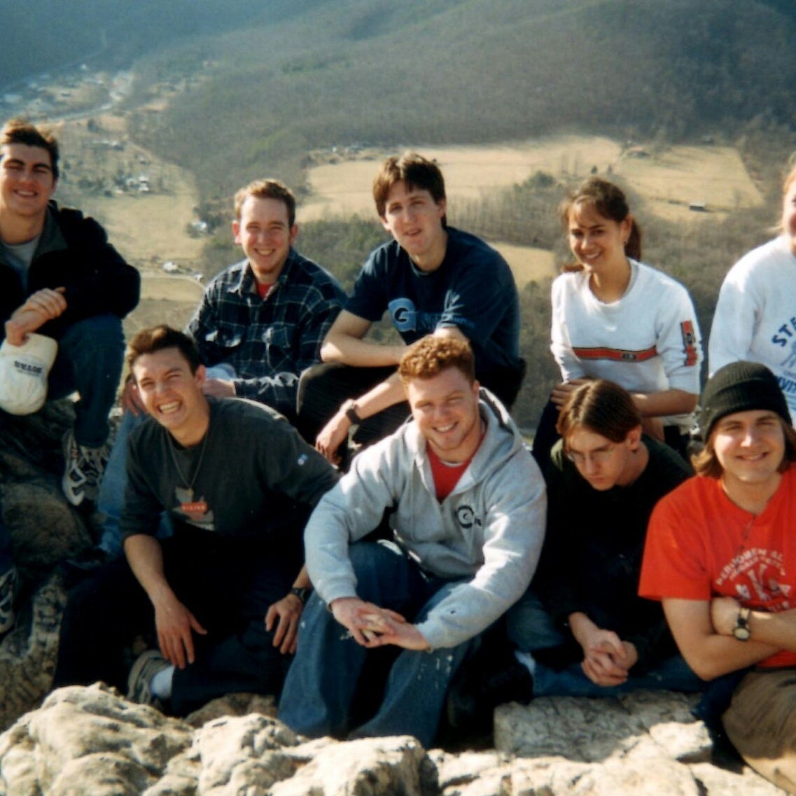 Daniel Rigby with friends at a scenic viewpoint in West Virginia