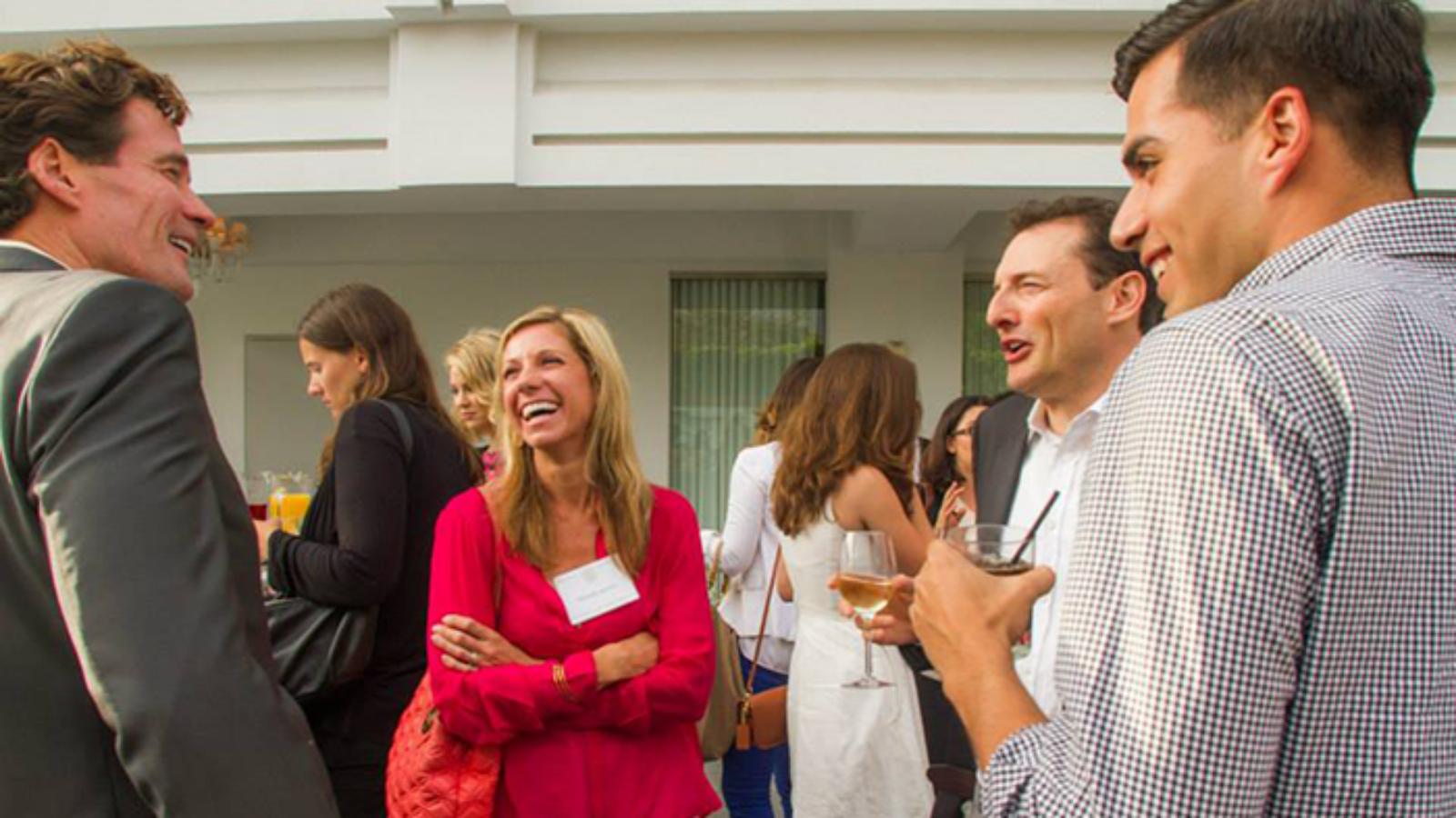 L.A. alumni greet one another after the L.A. Entrepreneurship panel in June 2014.