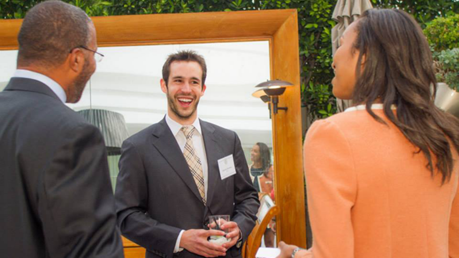 Club president Schuyler Hawkins (C'10) with fellow L.A. alumni.