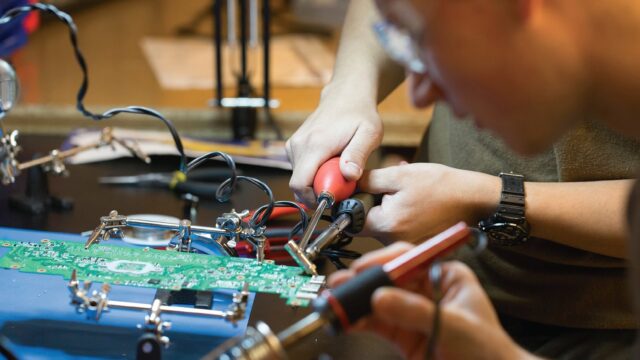student working in maker hub
