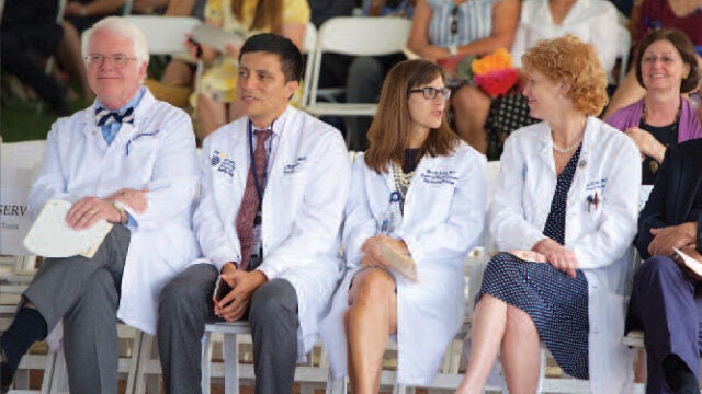 medical faculty sitting in a row