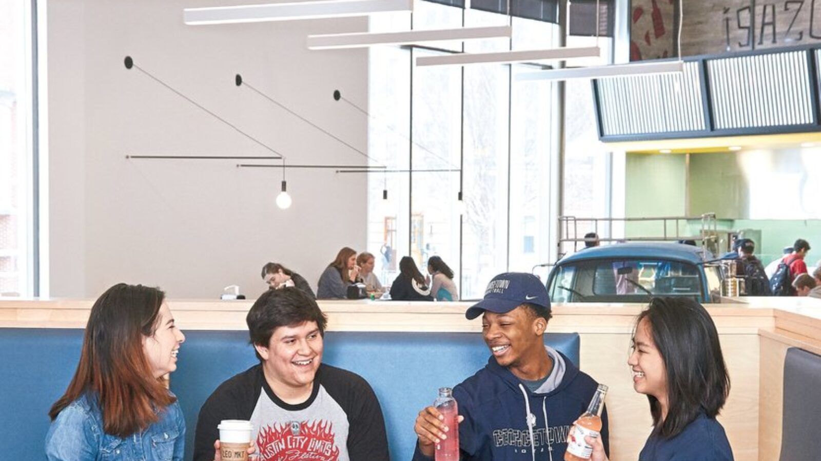 from left: Alondra Navarro (C’19), Mizraim Belman-Guerrero (F’20), Brian Davis (B’21), and Trixia Apiado (F’18) relax in a space designed to promote conversation.