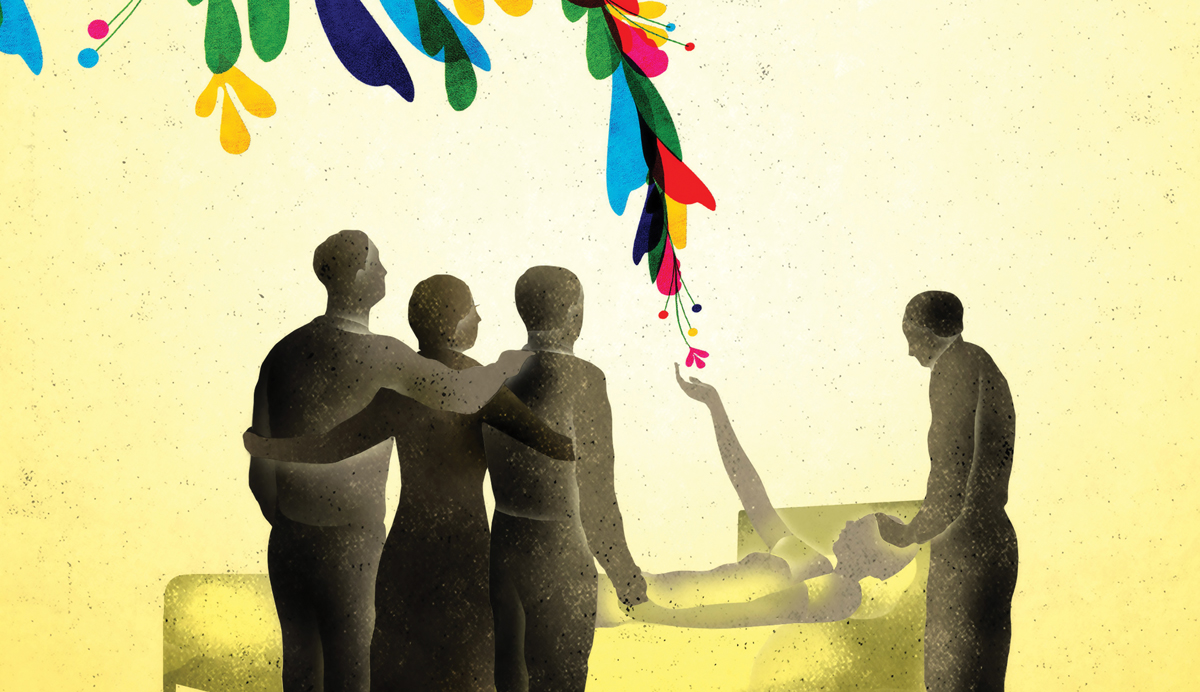 family gathering around someone on death bed