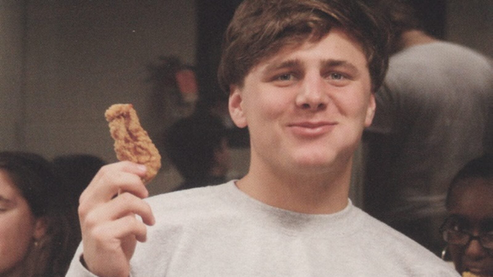 kid eating chicken tender