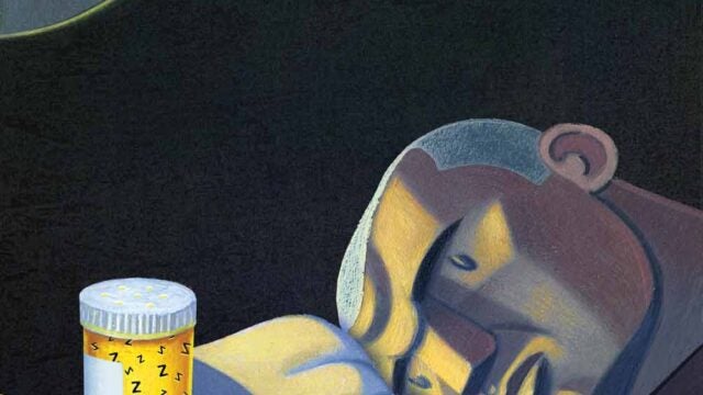 cartoon of man in bed staring longingly at pills