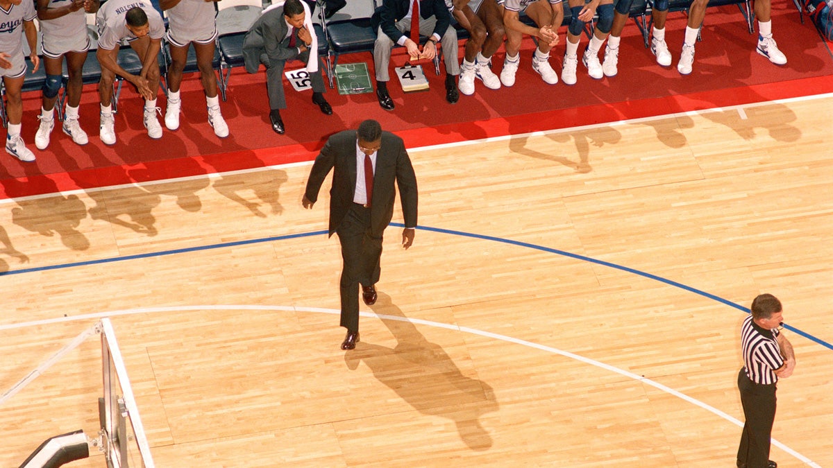 coach thompson walking across the court