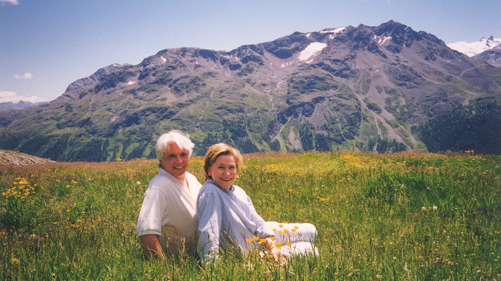 otto and janne ruesch sitting in grassy field