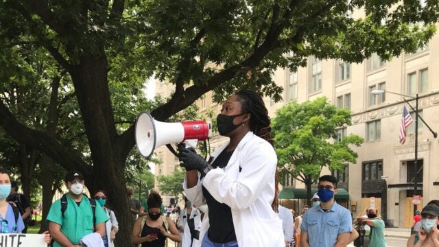 Georgetown medical student Jennifer Gyamfi Holiday (M’22) speaks to health care providers about anti-Black racism and implicit bias in medicine before a White Coats for Black Lives protest at the White House in June.
