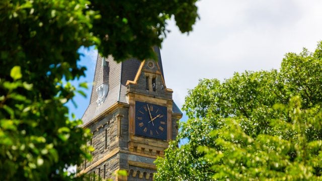healy clock tower with trees