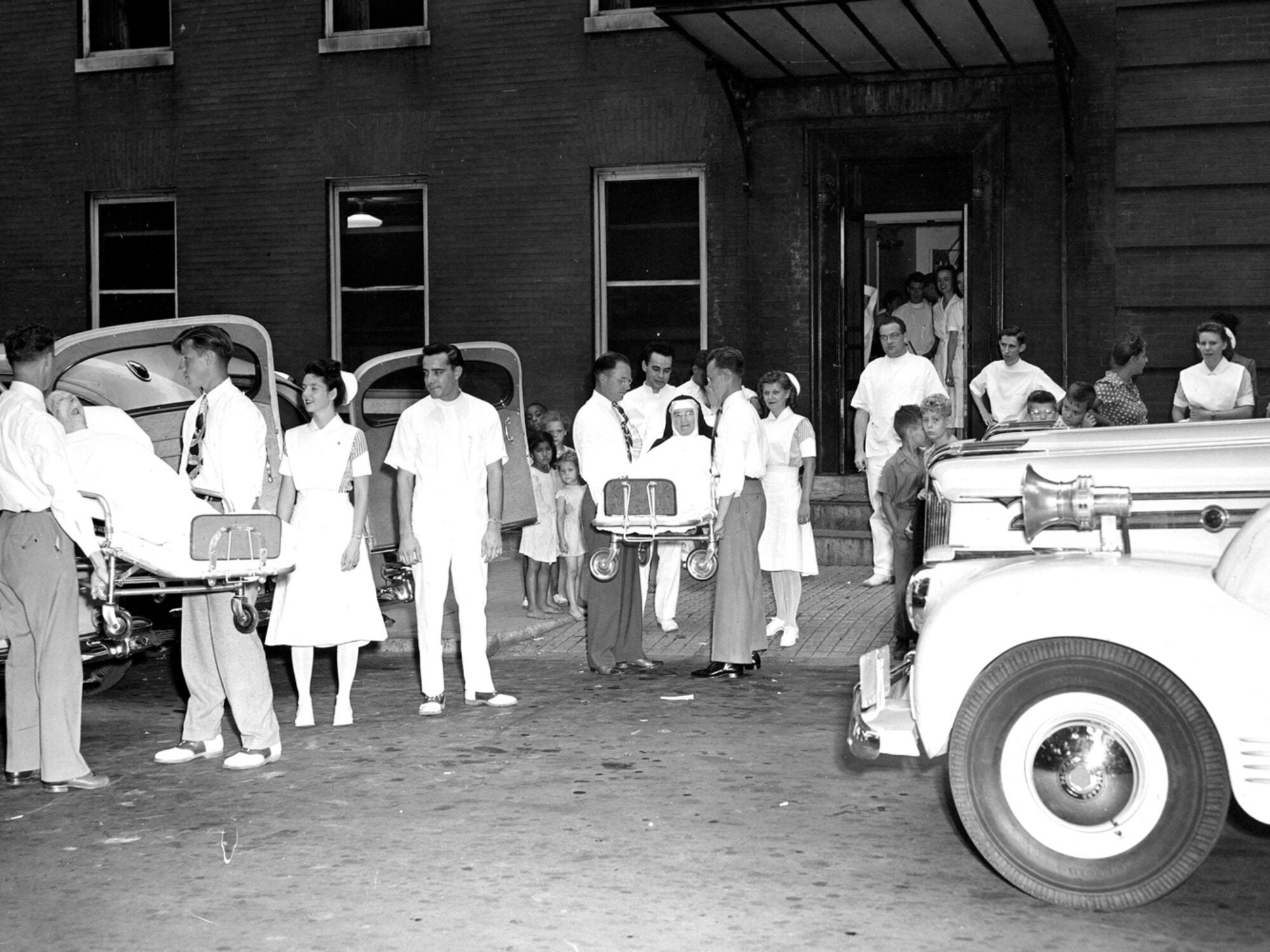 From the Archives In the summer of 1947, patients were moved via ambulance from the old Georgetown Hospital at 35th and N Streets NW to the new facility on Reservoir Road, as young neighbors look on. The former hospital, dating back to 1898, has served as an undergraduate dormitory since the 1960s.