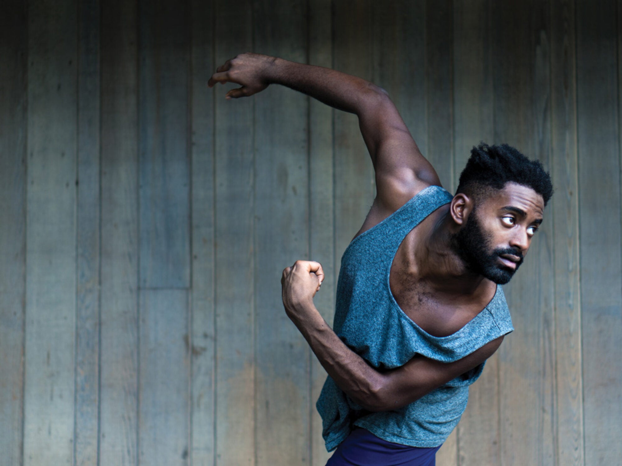 Jerron Herman teaches movement from one of his solos in front of dance majors.