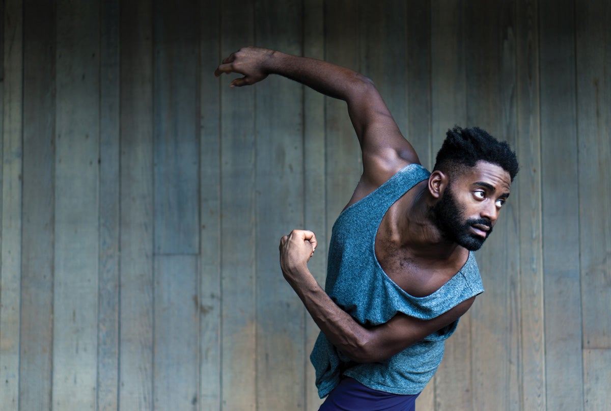Jerron Herman teaches movement from one of his solos in front of dance majors.