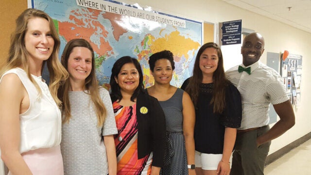 rior to the pandemic, McKinney (far right) invited Dr. Poorva Dharkar (fourth from right) to campus to meet with Georgetown’s Women in Science & Education student group leaders. At the time Dharkar was president of the Association for Women in Science, Bethesda Chapter. She and the students discussed ways to support gender equity in science.