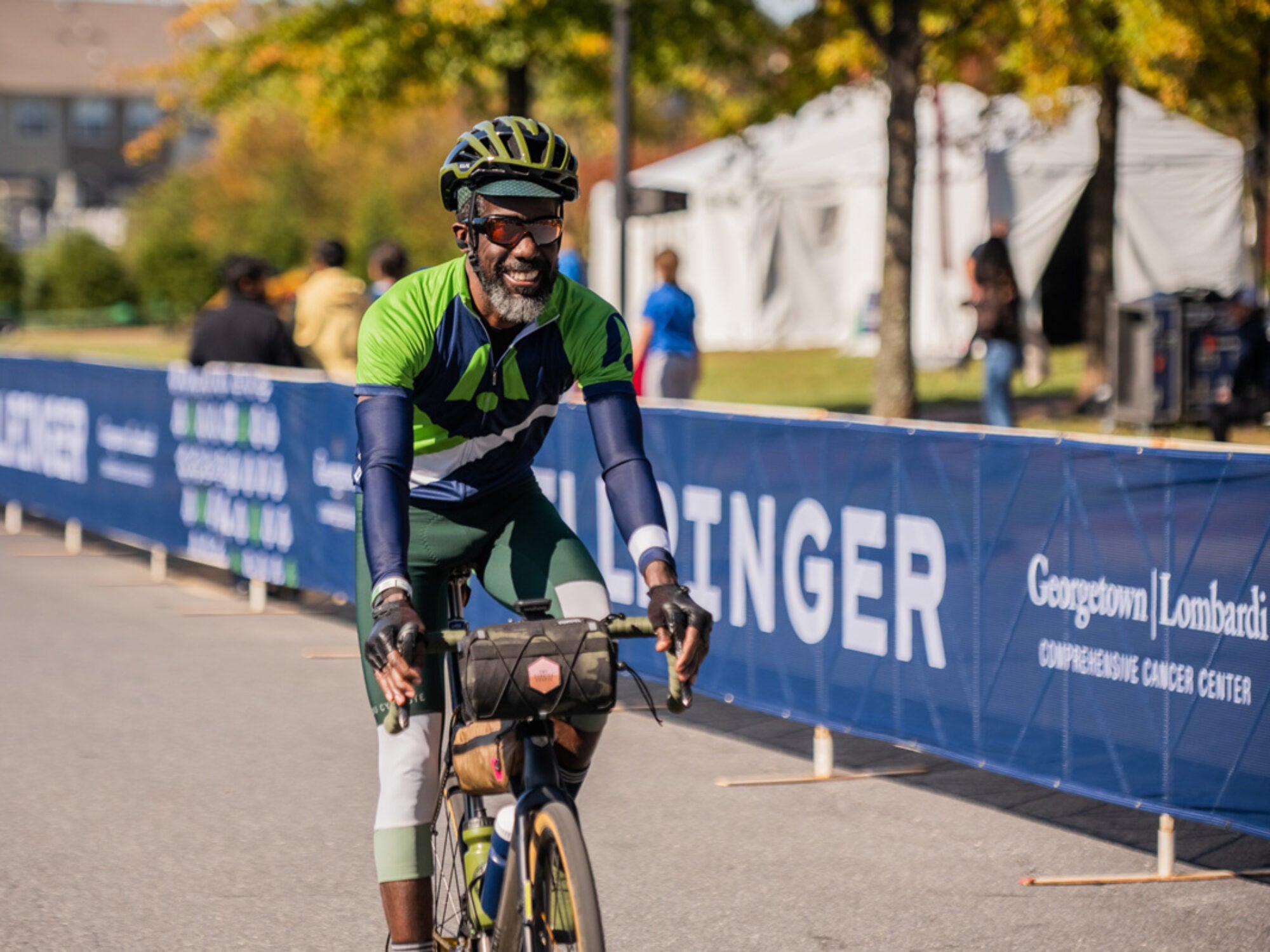 person riding bike smiling
