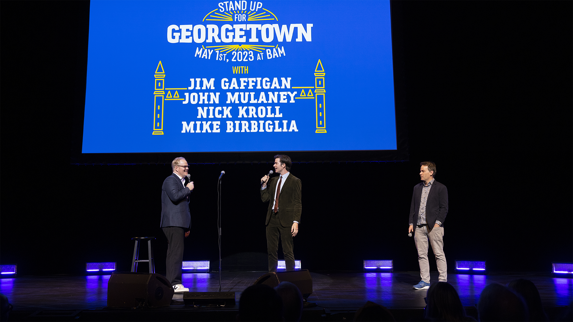 Jim Gaffigan, John Mulaney, and Mike Birbiglia onstage at Stand Up for Georgetown, May 1, 2023, at the Brooklyn Academy of Music