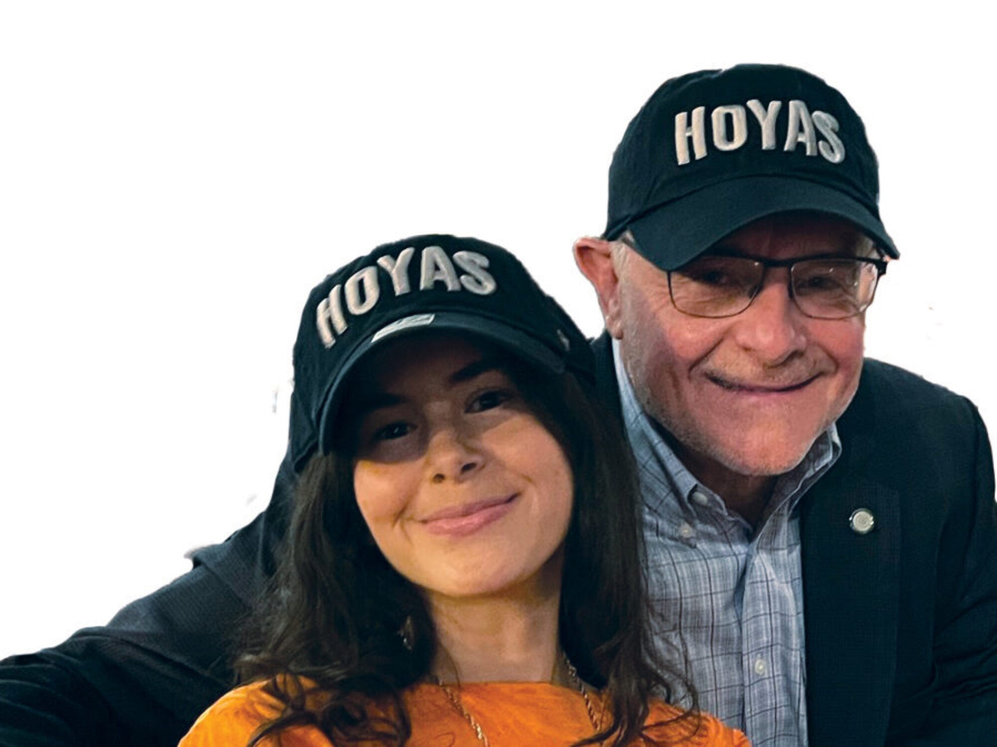a man and a woman in Hoya caps stand together