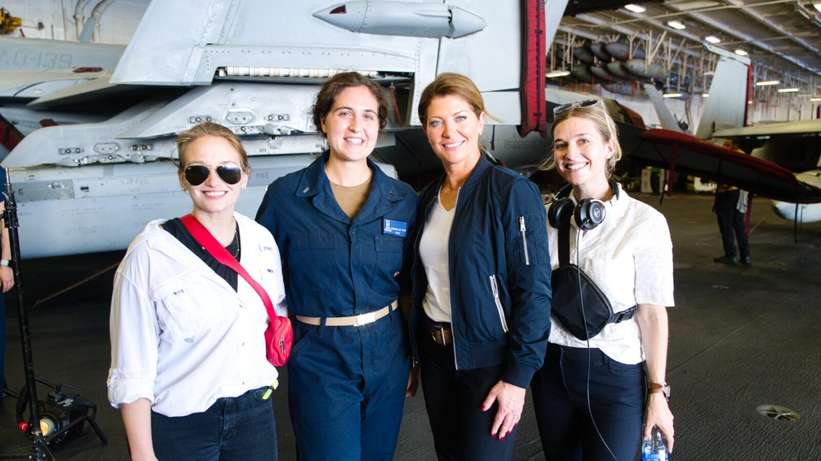 o donnell with people in front of plane