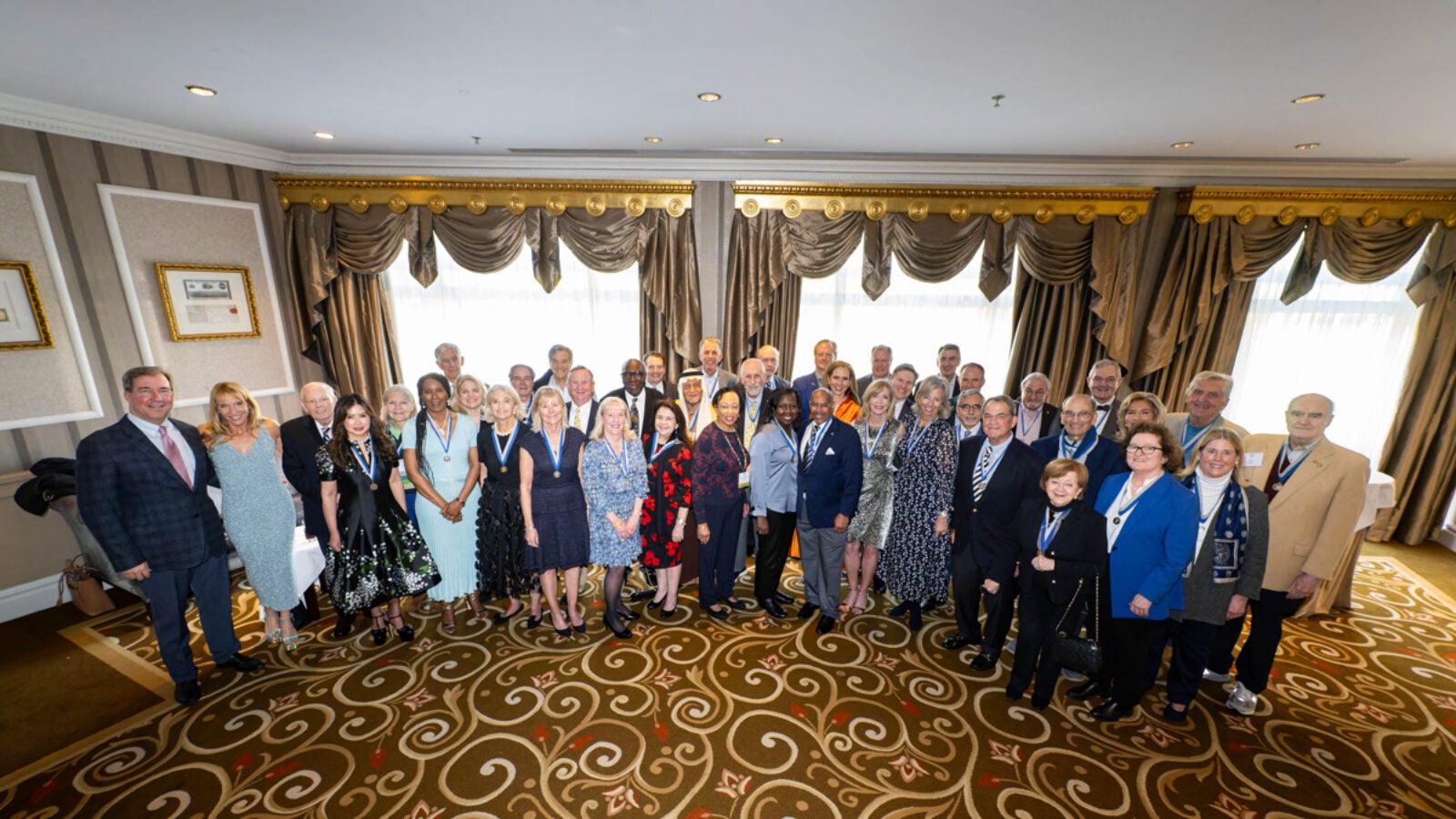 people posing in group