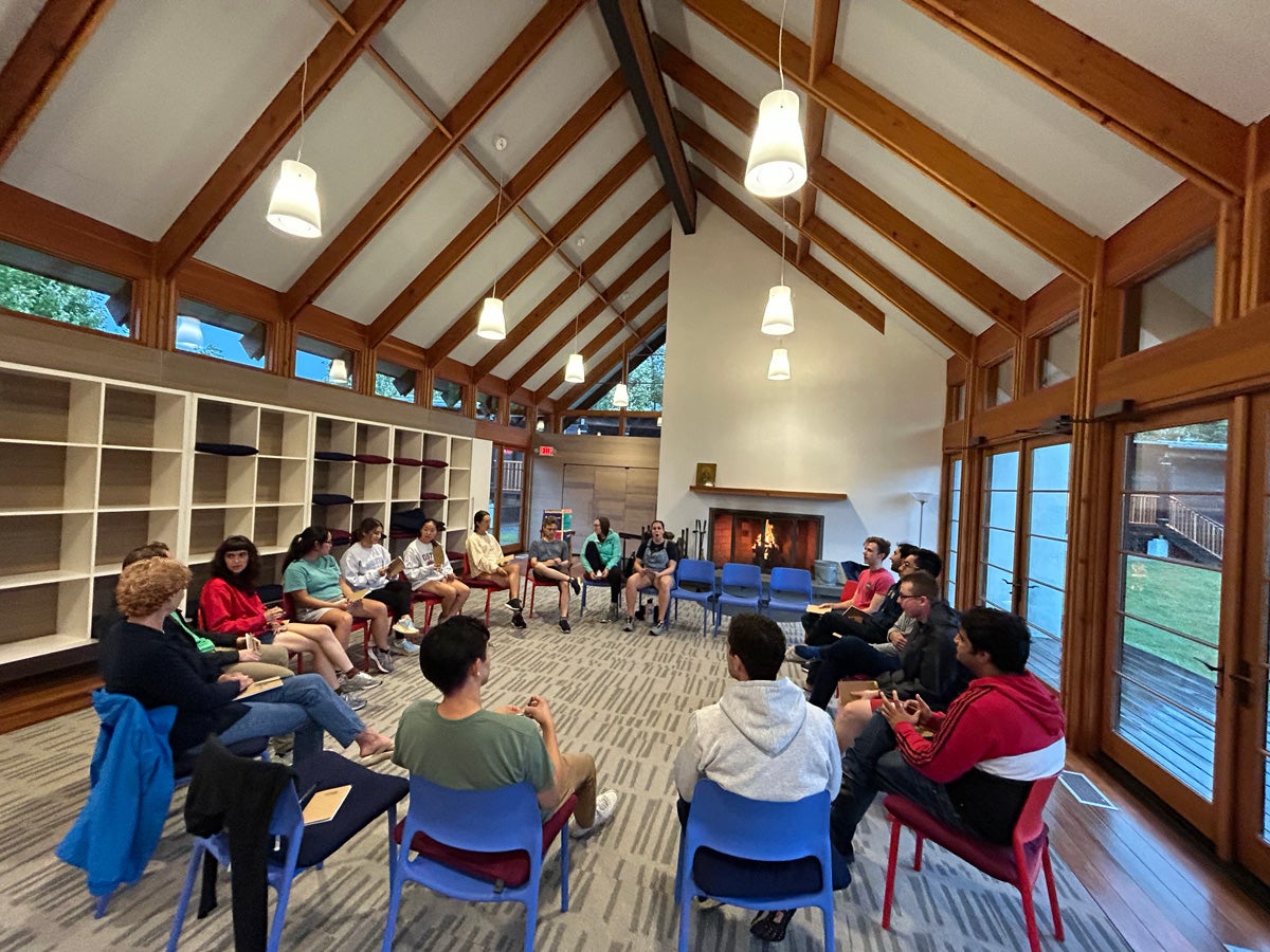 students sitting in circle at the calcagnini center