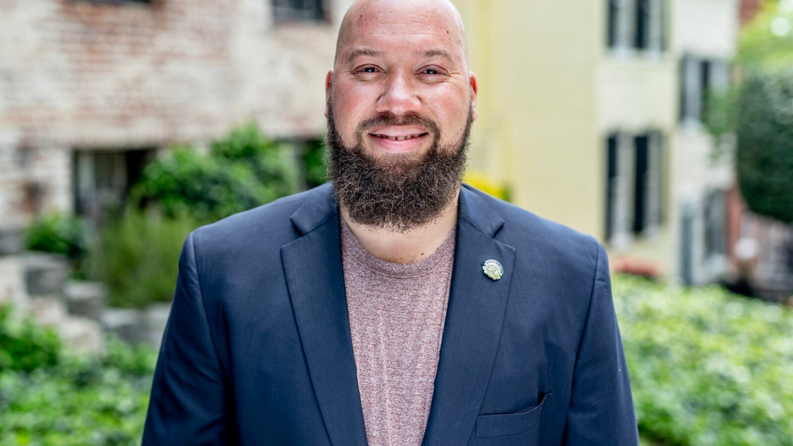 a man in a navy suit