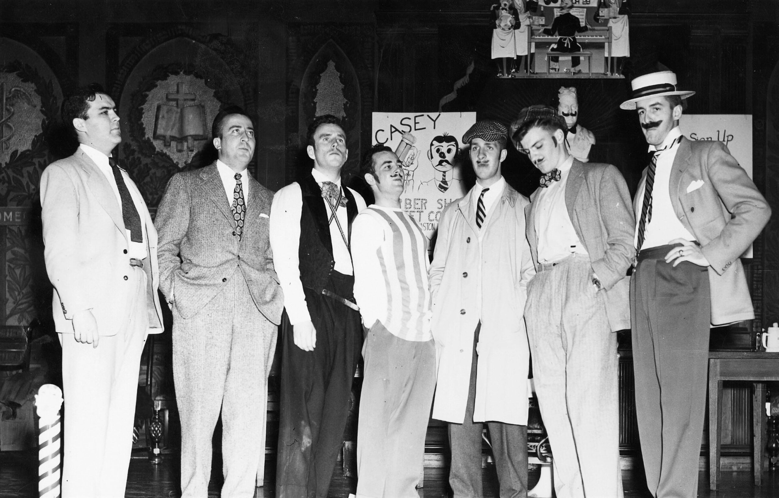 Georgetown Chimes making a guest appearance at the First Annual Barbershop Quartet Contest in March 1950. Pictured, left to right: Frank Jones; Jack Farrell; Ray O’Hara; Ray O’Brien; Frank Owens; Reid Broderick; and Tom Zirpolo. | Photo: Georgetown University Archives