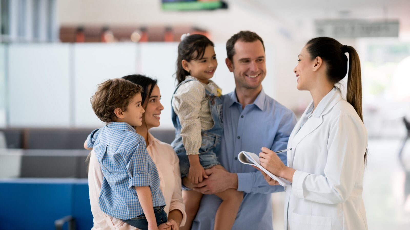 kids with parents and doctor