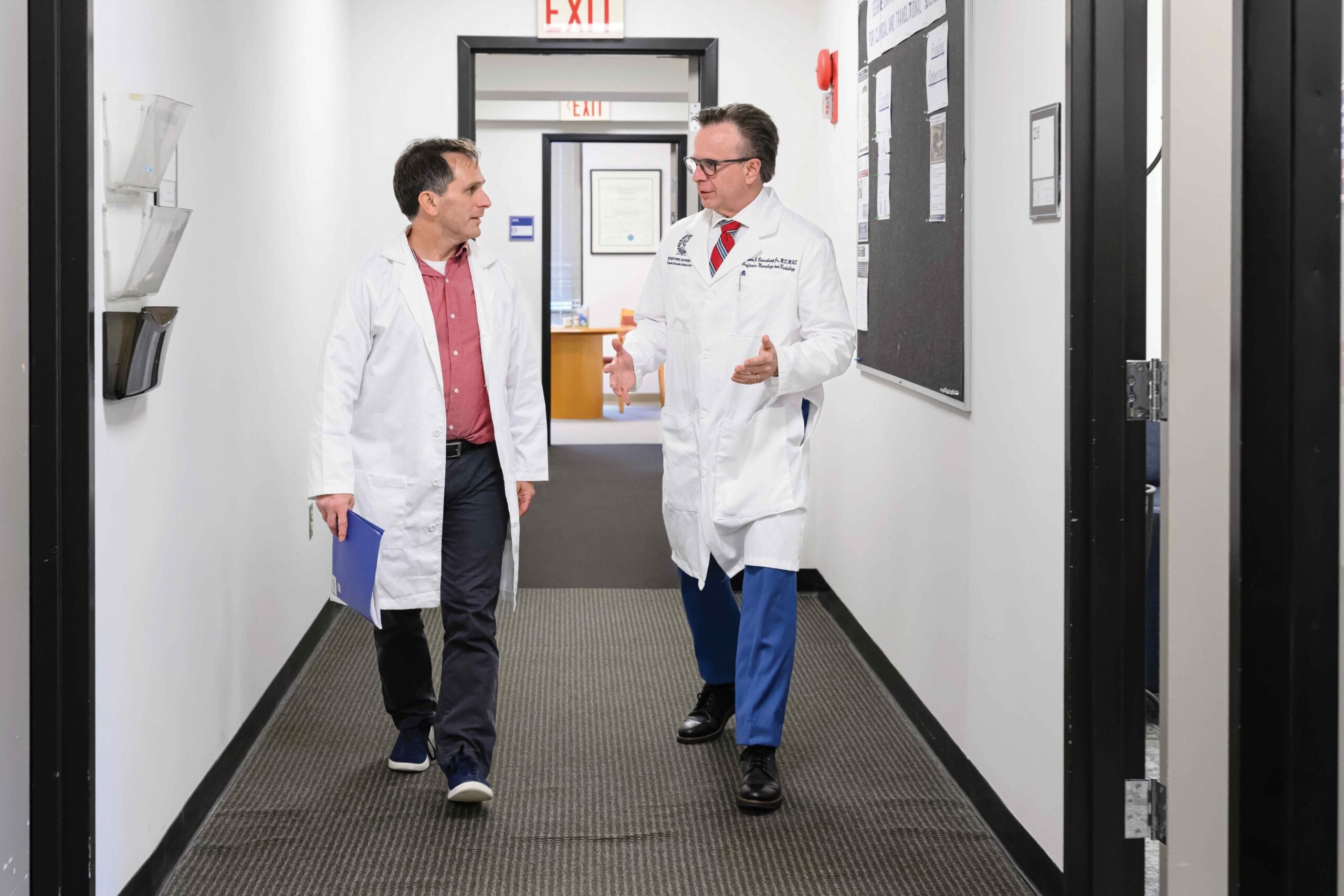 Beauchamp spent his first months on a listening tour, meeting here with Dan Merenstein, M.D., professor of family medicine in the School of Medicine and professor of human science in the School of Health.