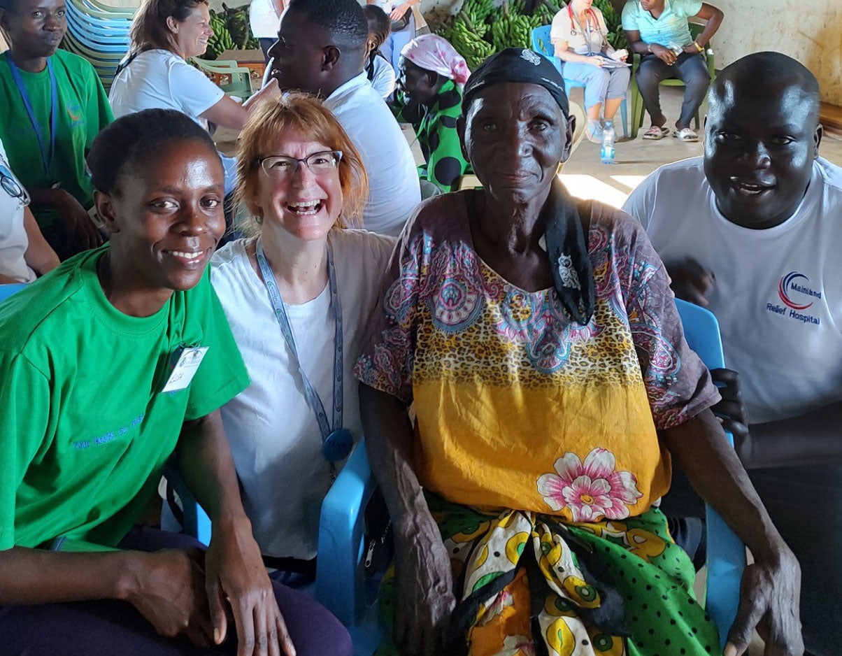 Tammy Kenney Bevins posing with people