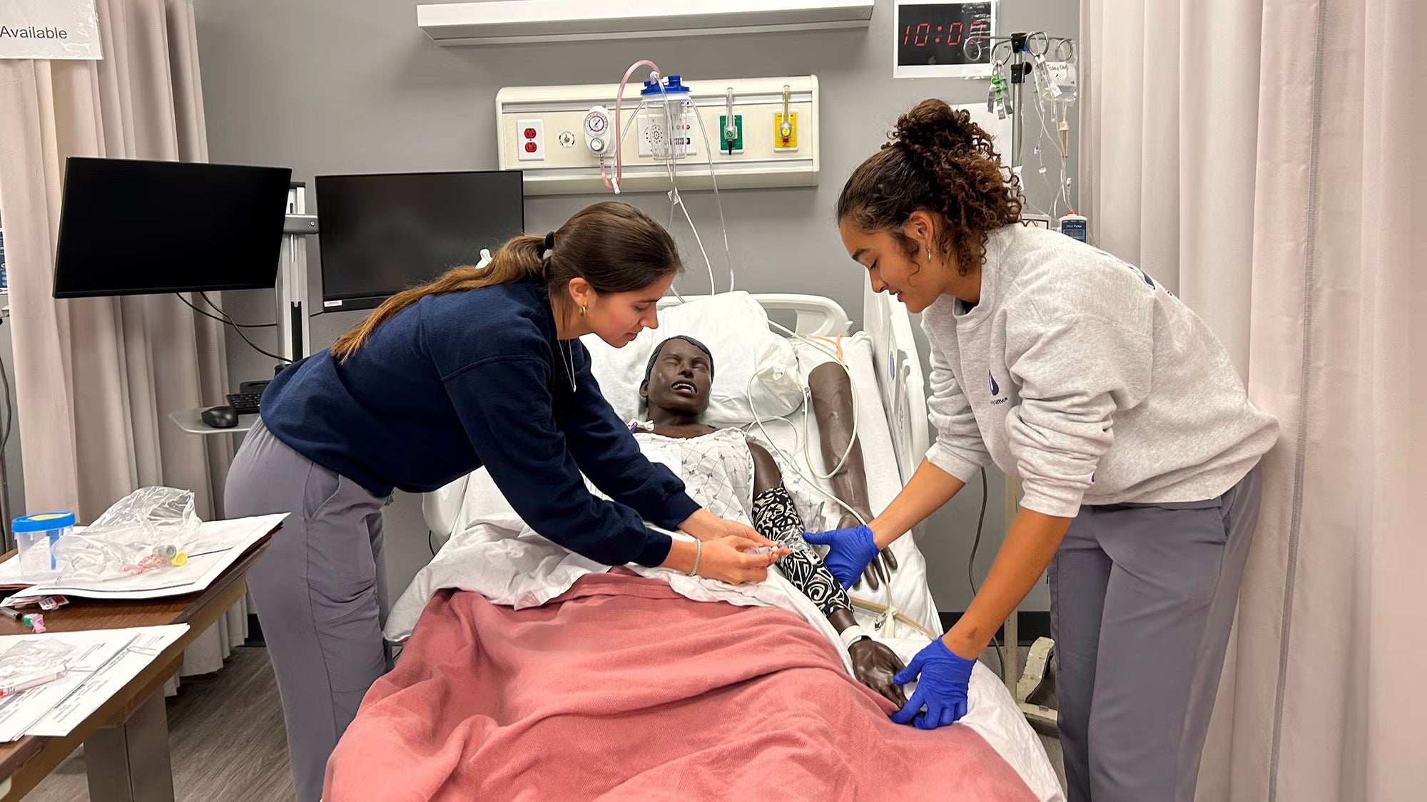 Nursing students get hands-on experience in the O’Neill Family Foundation Clinical Simulation Center. Dean Roberta Waite says “there’s a real momentum building at the nursing school.”