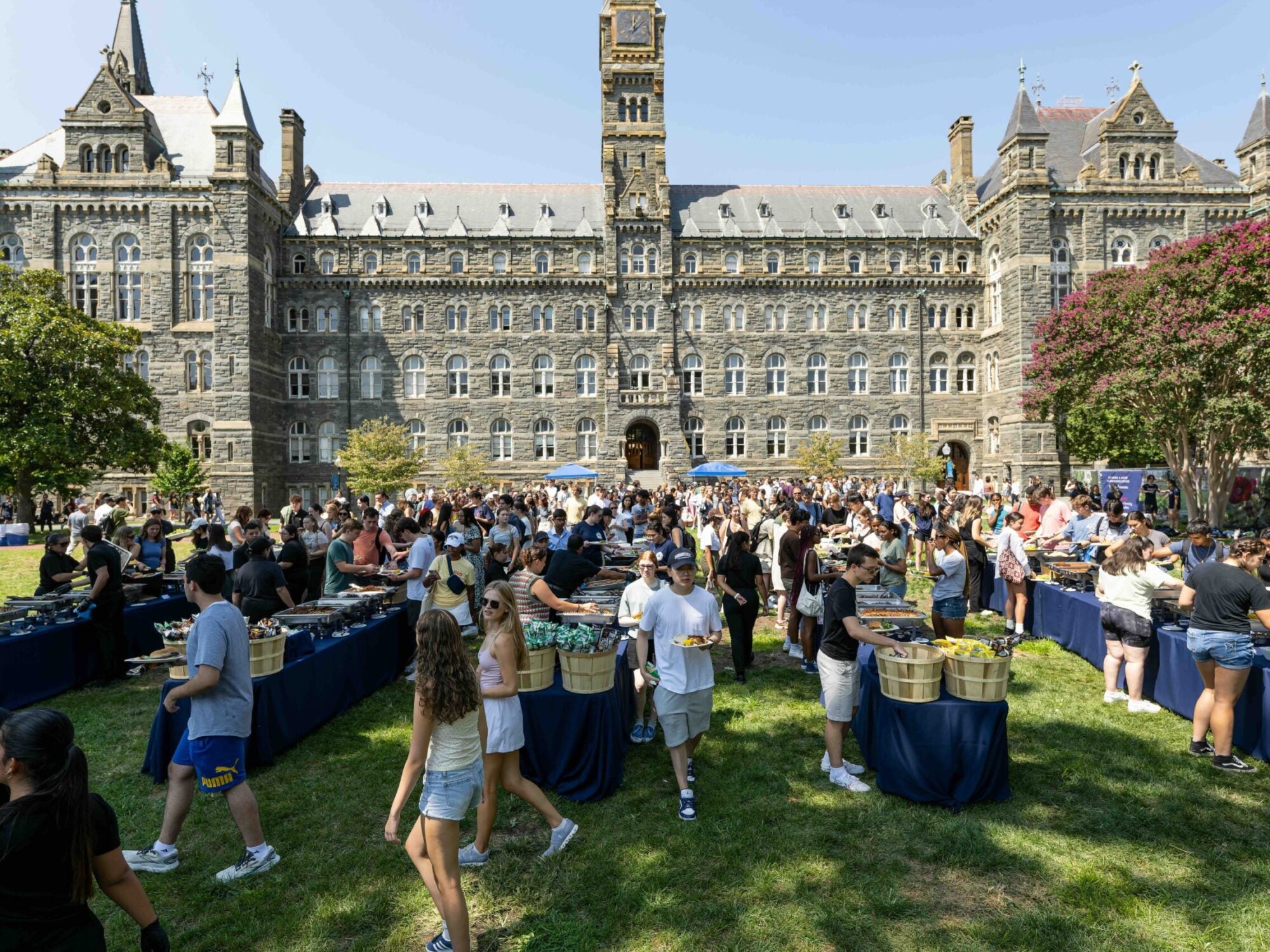 students in front of healy for picnic