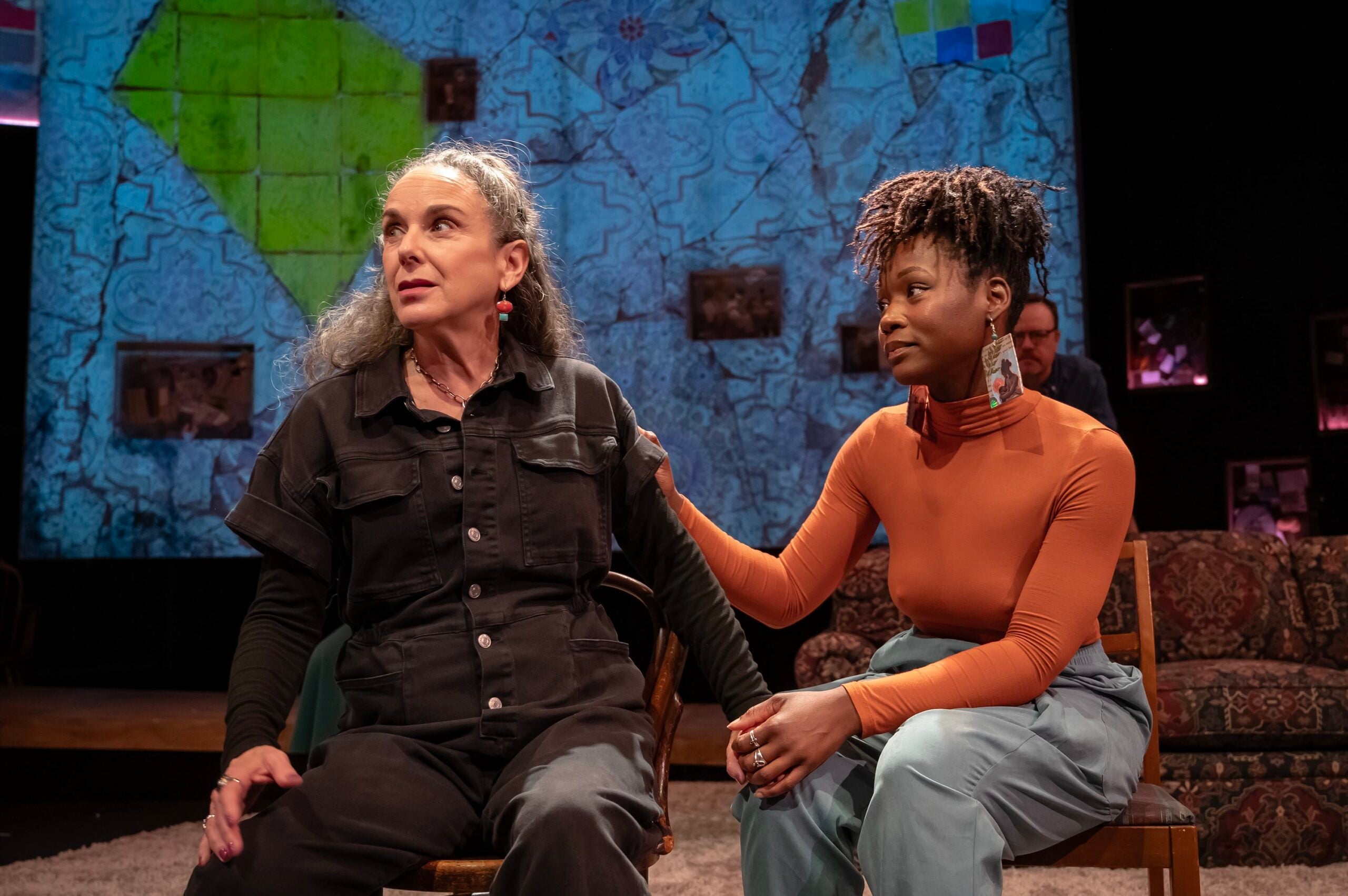 two people on a stage in a play