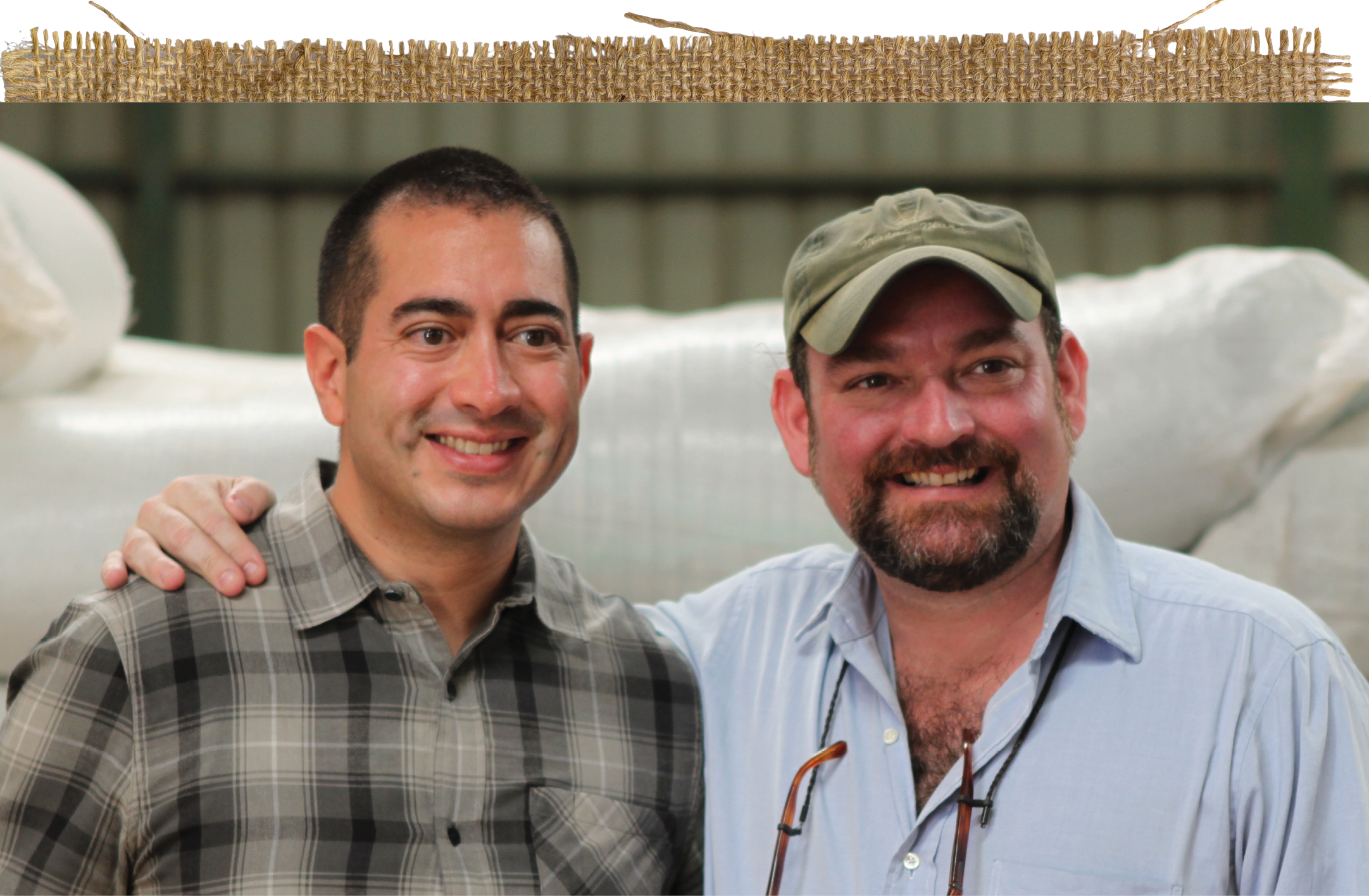 Longtime friends and collaborators Martín Mayorga (B’97) (left) and Kevin Marinacci (C’89) at a coffee harvest in Nicaragua.