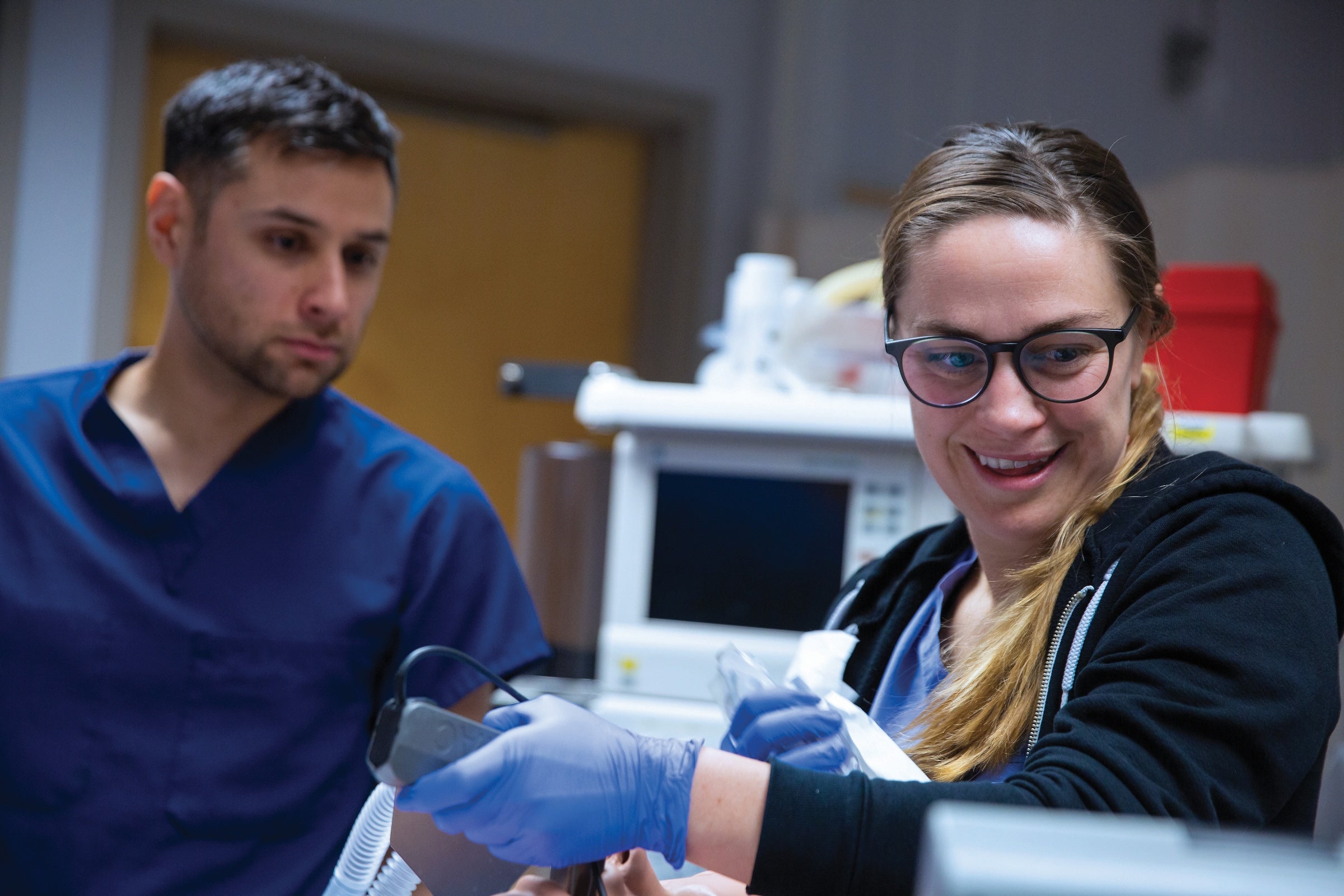 Nursing graduate students work in The O’Neill Family Foundation Clinical Simulation Center.