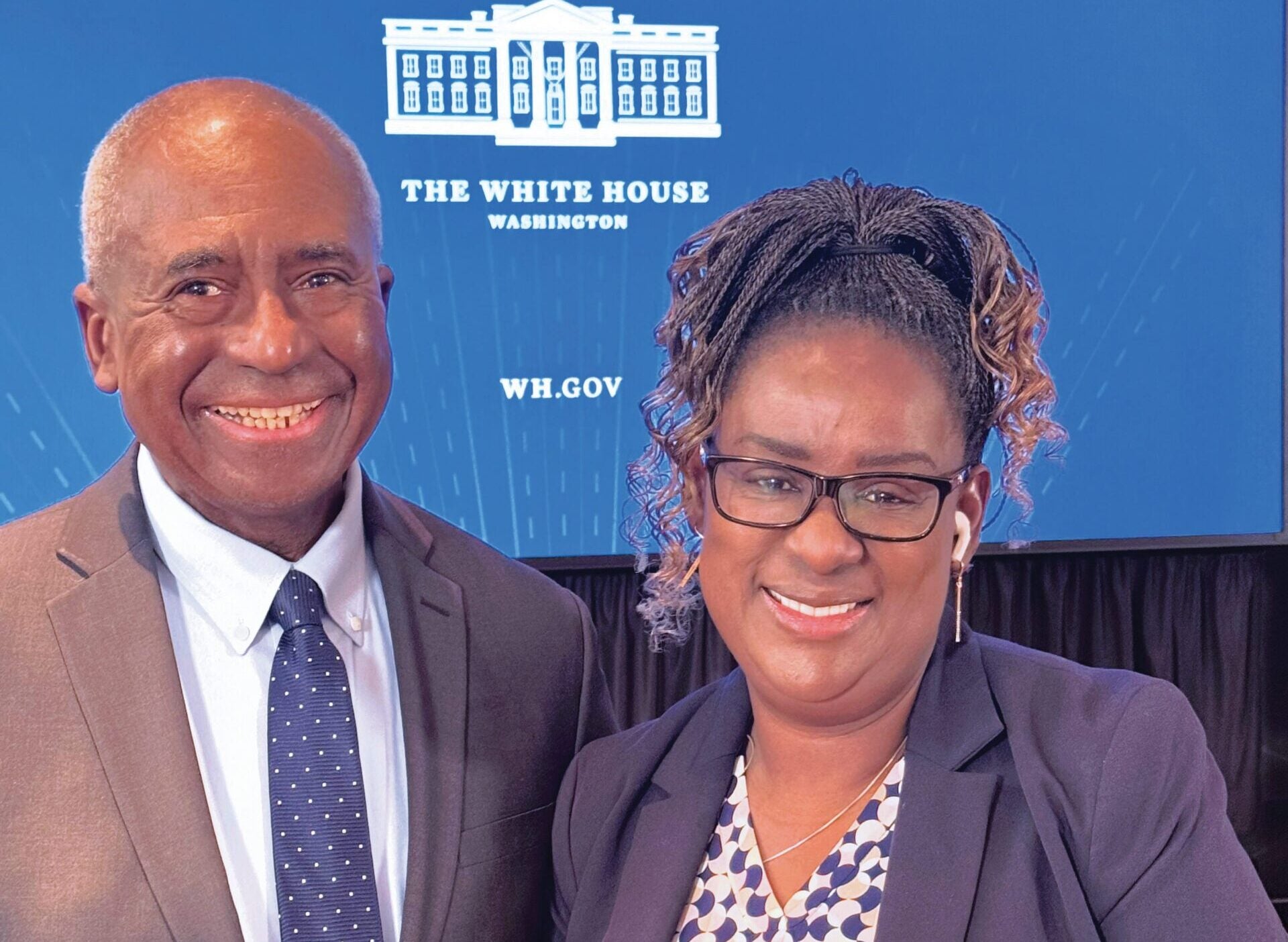 Martha Cameron (G’25, ’30) with Ronald Johnson, chair of The U.S. People Living With HIV Caucus, at an HIV Quality of Life Symposium at the White House.