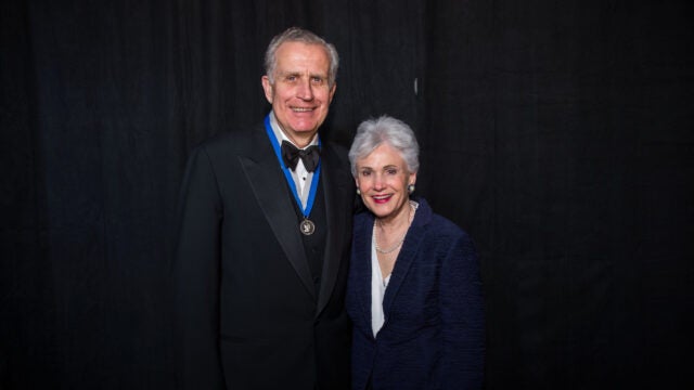 paul tagliabue and his wife posing