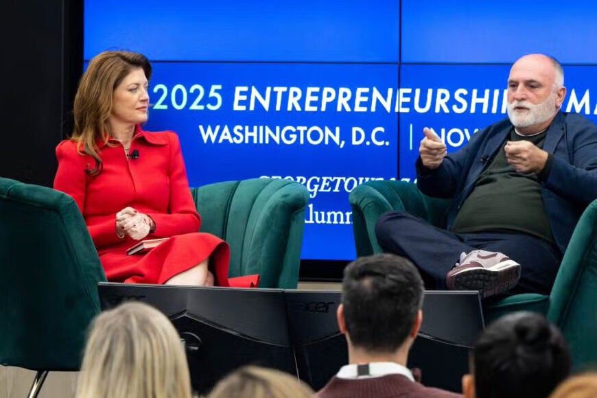 norah o donnell talking at a panel with jose andres