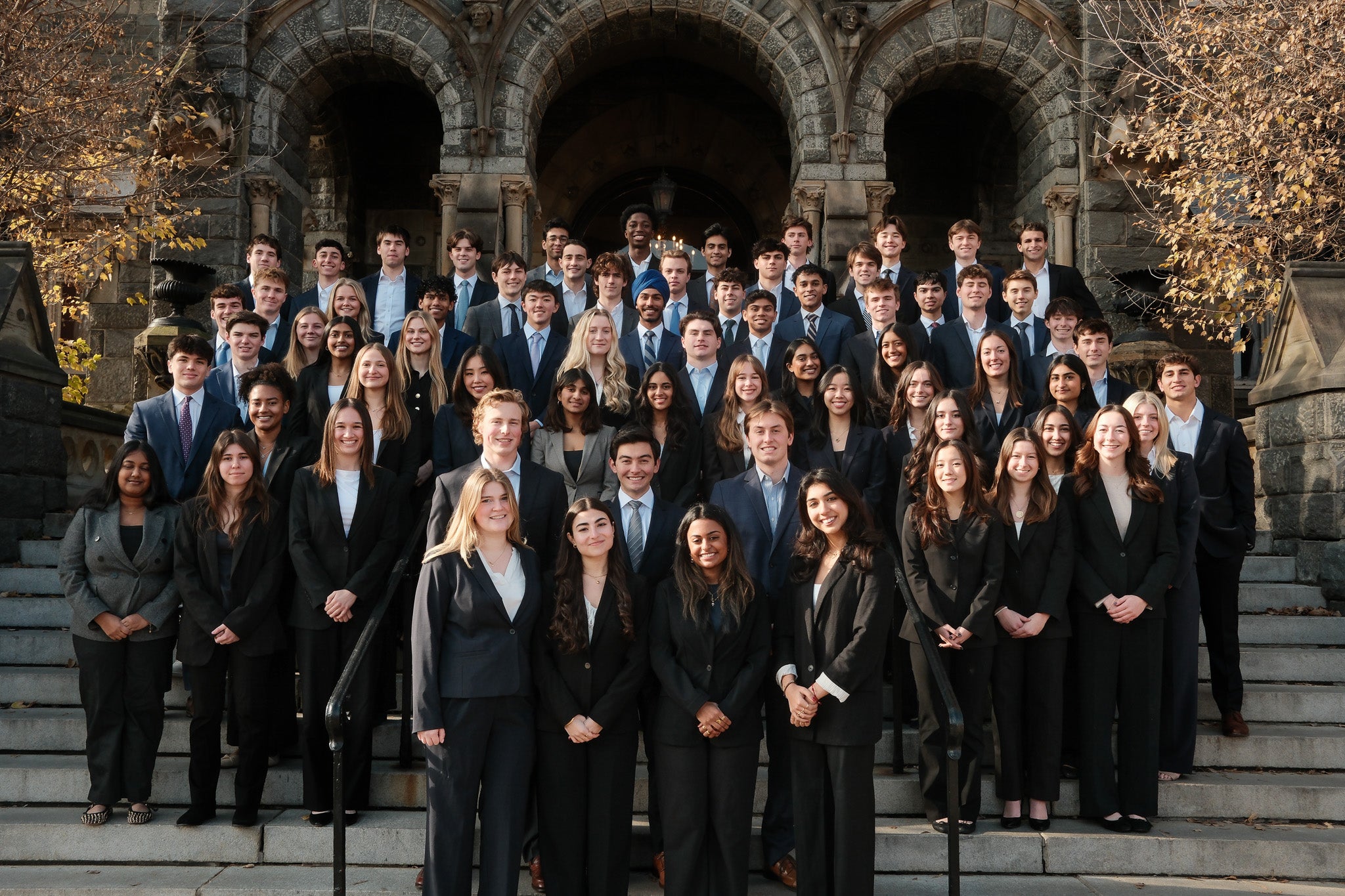 all student members of gusif posing in front of healy