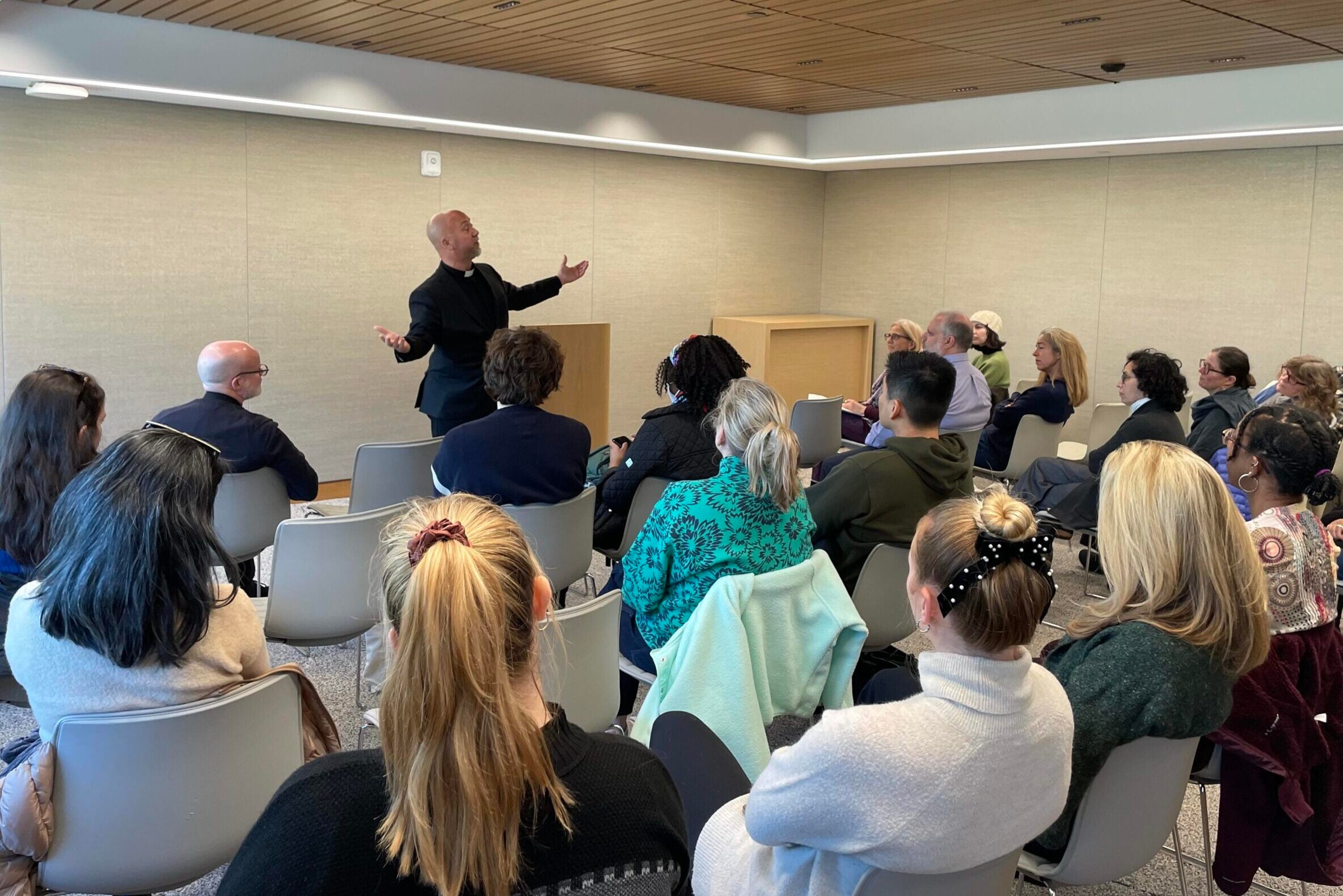 Father Barton Geger, S.J., leads an event at the new Multifaith Center on the Capitol Campus during Jesuit Heritage Month in November 2025.