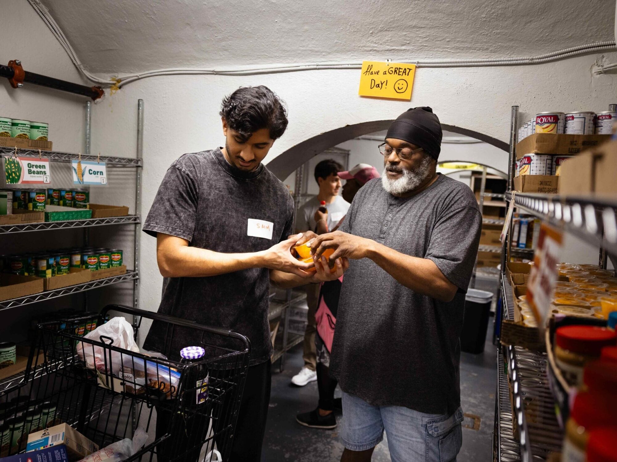people packing meals for the homeless