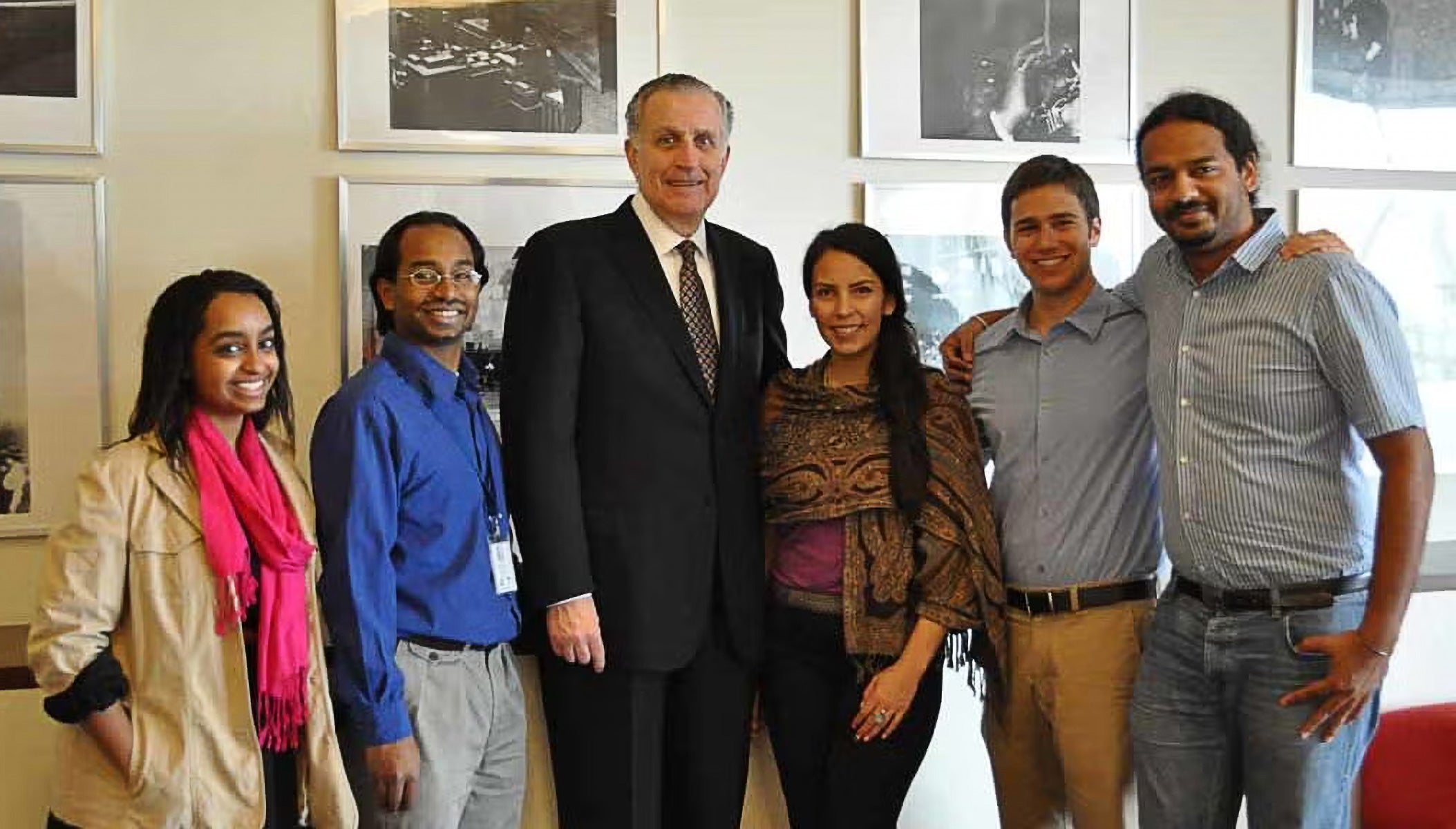 paul tagliabue posing smiling with georgetown SFS students