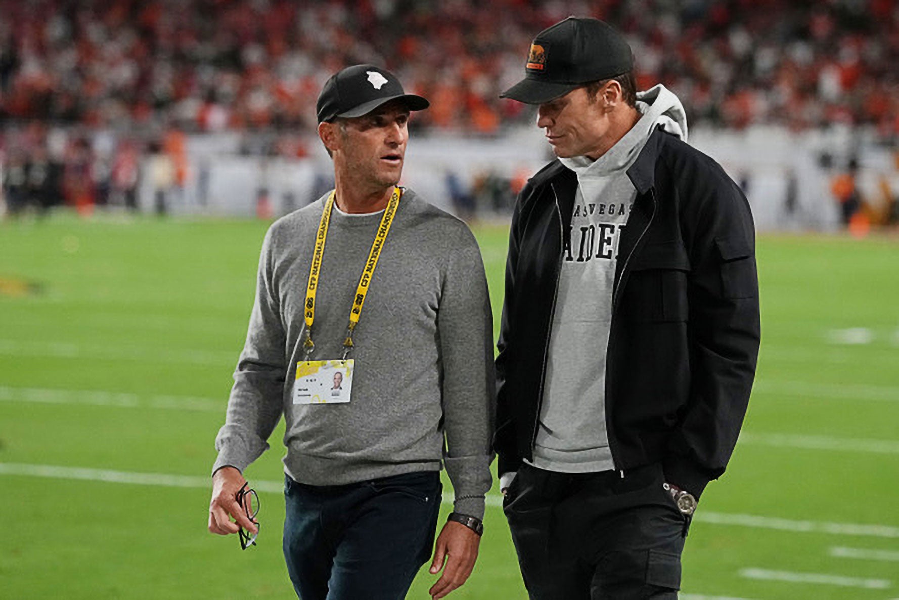 Egon with Tom Brady at a raiders game