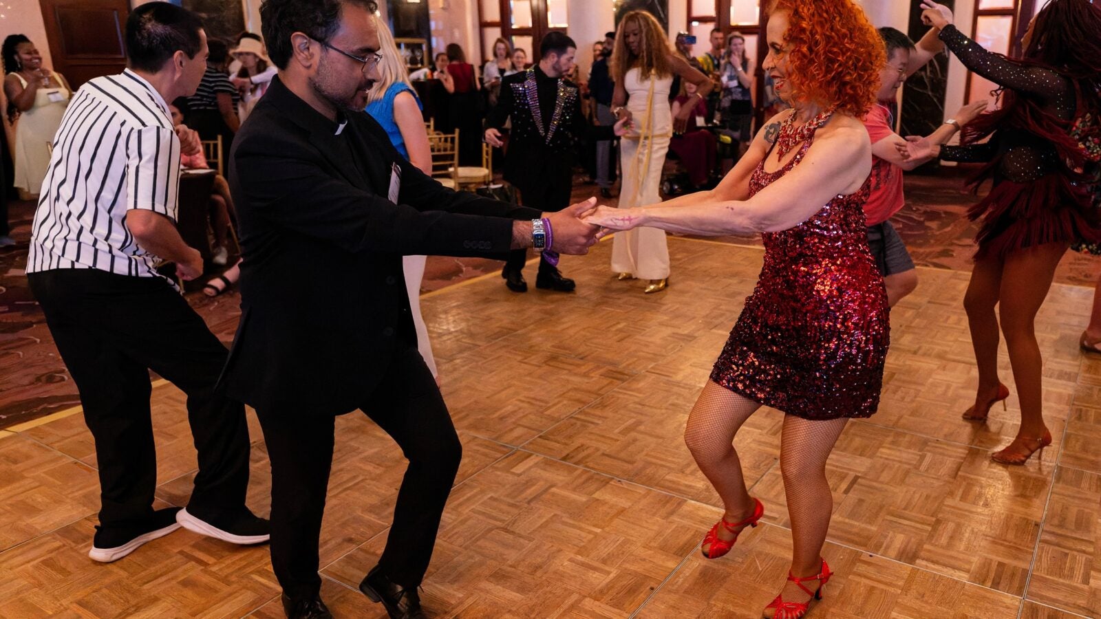 jcw weekend attendees dancing together