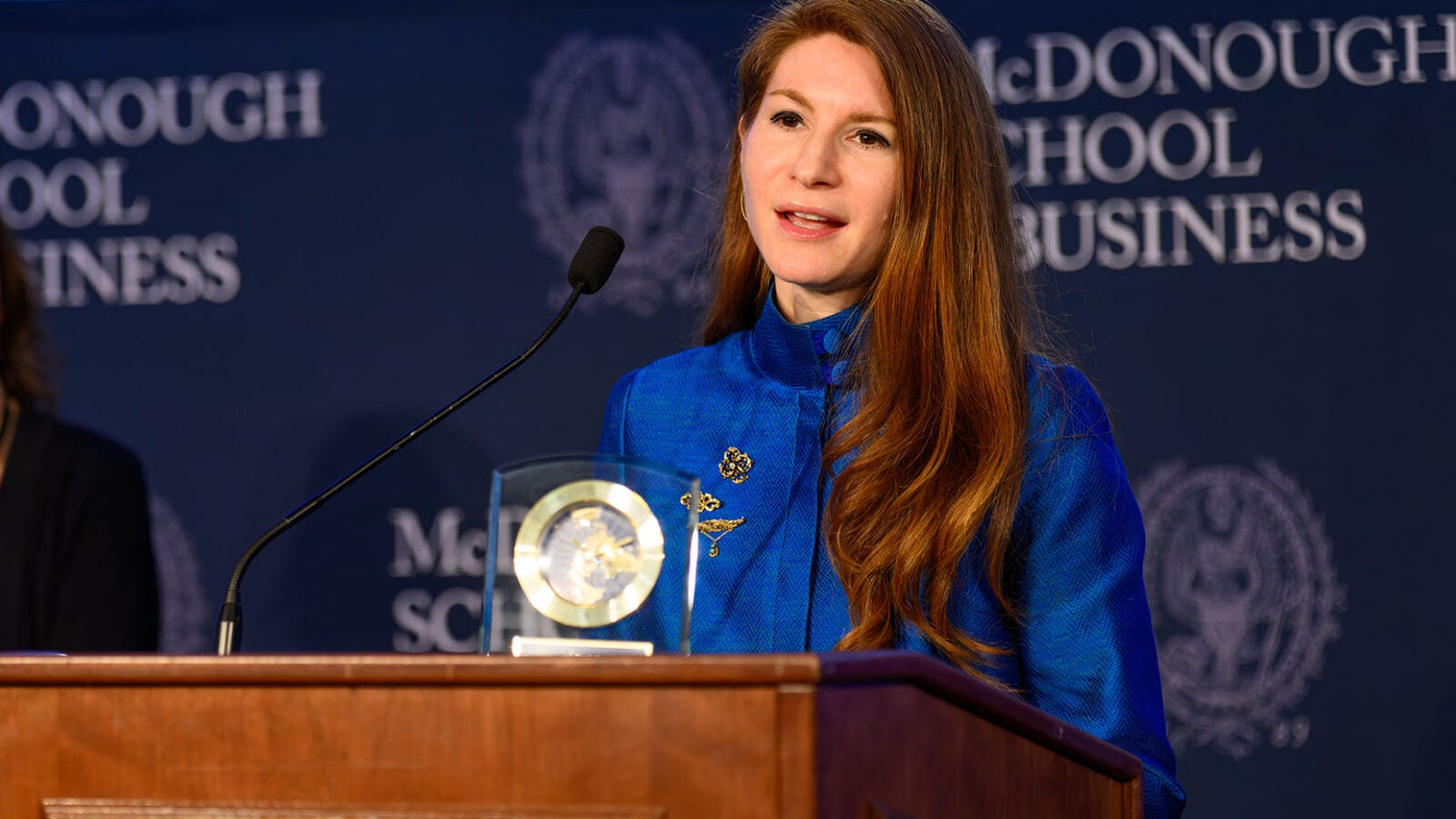Carrie Rich (G’09) accepting the 2025 Baratta Center Global Impact Award from the Baratta Center for Global Business Education at Georgetown’s McDonough School of Business