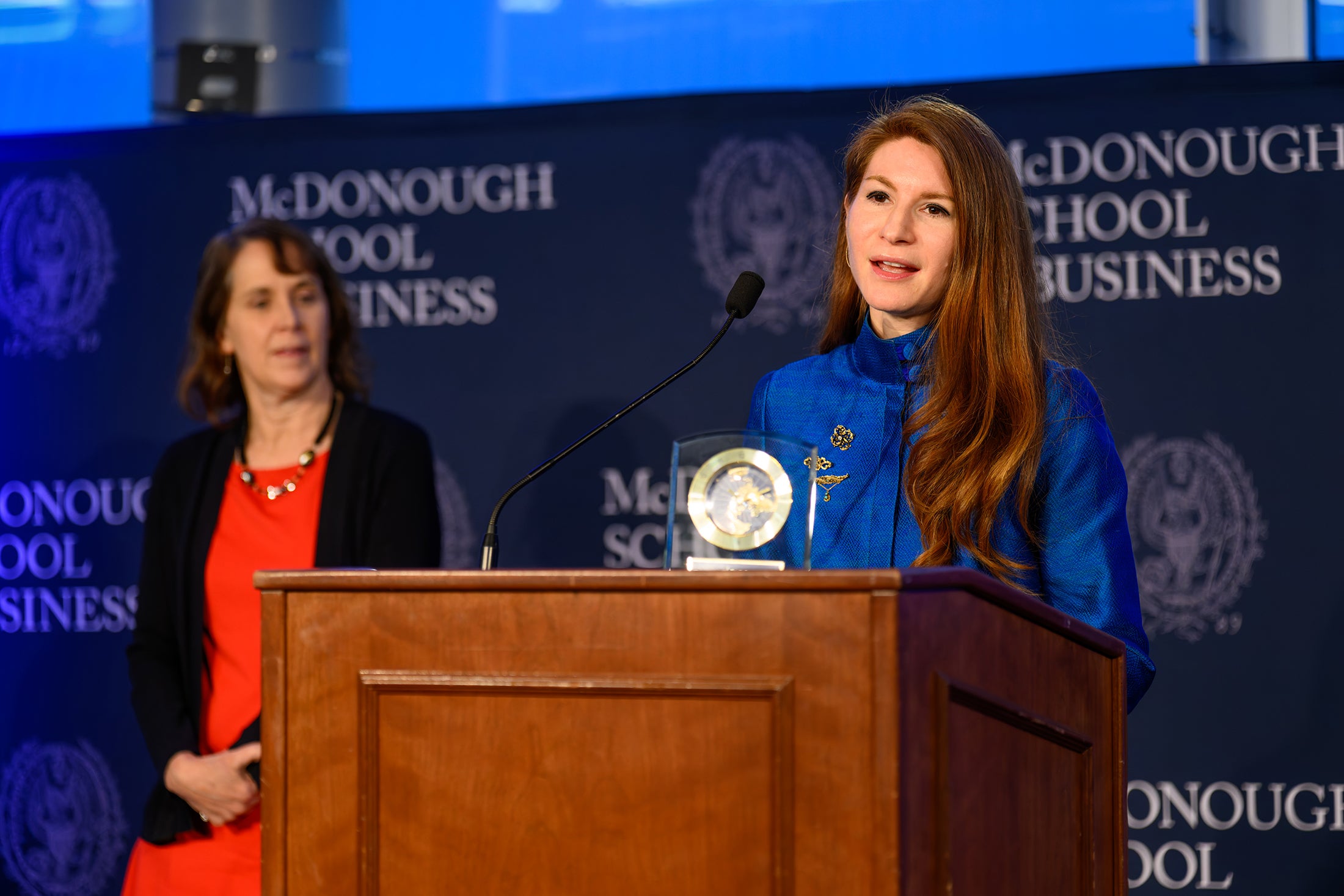 Carrie Rich (G’09) accepting the 2025 Baratta Center Global Impact Award from the Baratta Center for Global Business Education at Georgetown’s McDonough School of Business