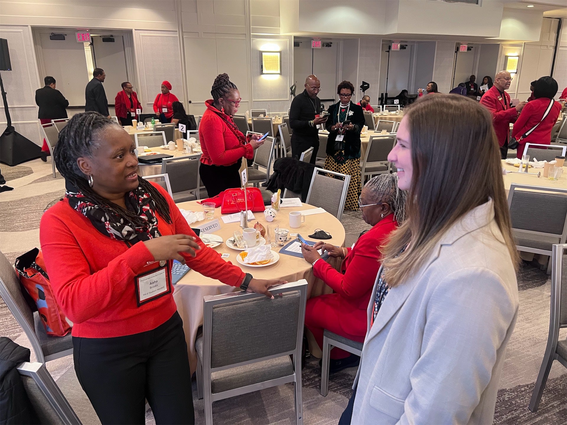 Former Chief Nursing Officer of the United States Surgeon General’s Office, Dr. Aisha Brooks (left) speaks with Strimling (right) at the annual National Black Nurses Association Hill Day, facilitated by Ellis.