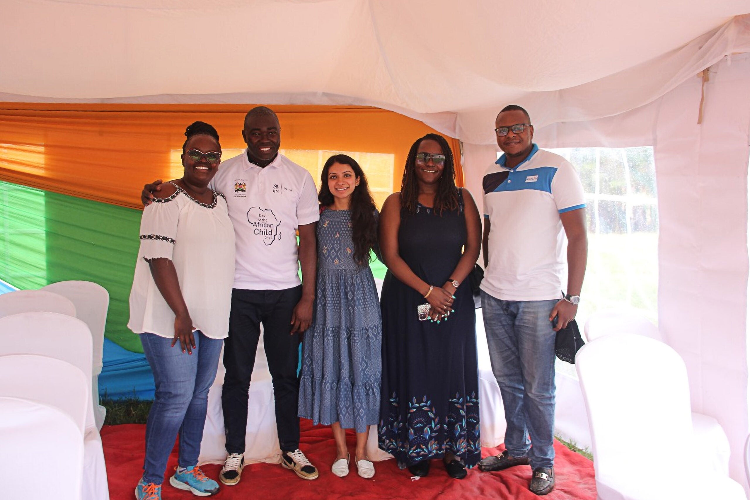 Siona Sharma (center) joined colleagues to visit a school in Malindi, Kenya in 2025 to further advocacy efforts for health education policy reform.