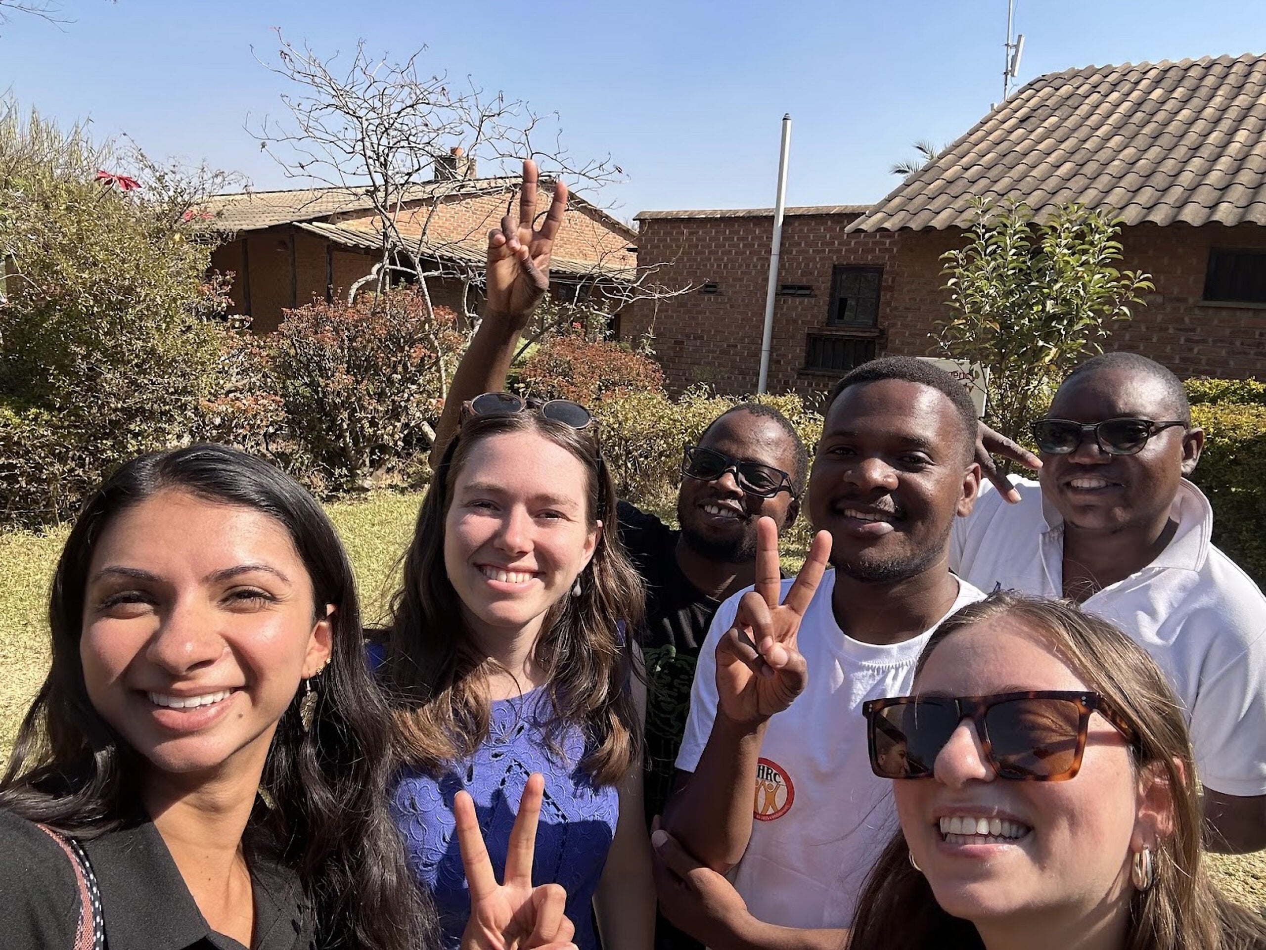 In Dedza, Malawi with fellow lawyers from the Center for Human Rights, Education, Advice, and Assistance, where Siona worked with marginalized communities on legal empowerment (2024).