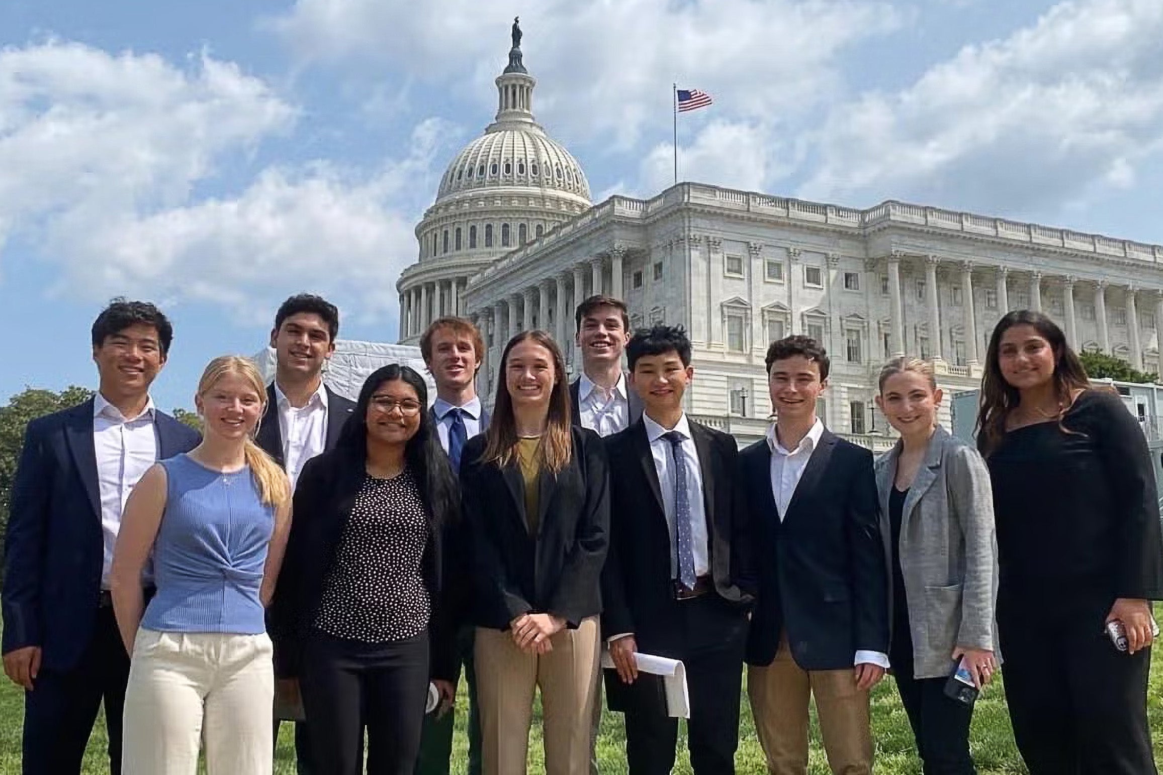 psaros fellows posing in front of capitol