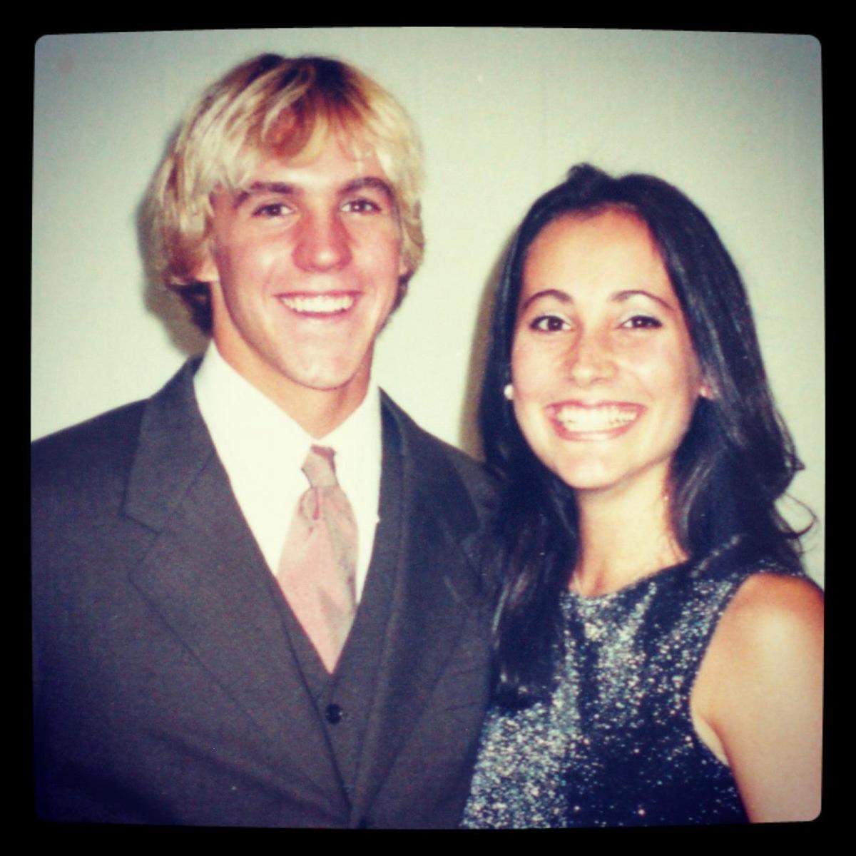 A young Mark and Giulia smile before their date to the first-year dance.