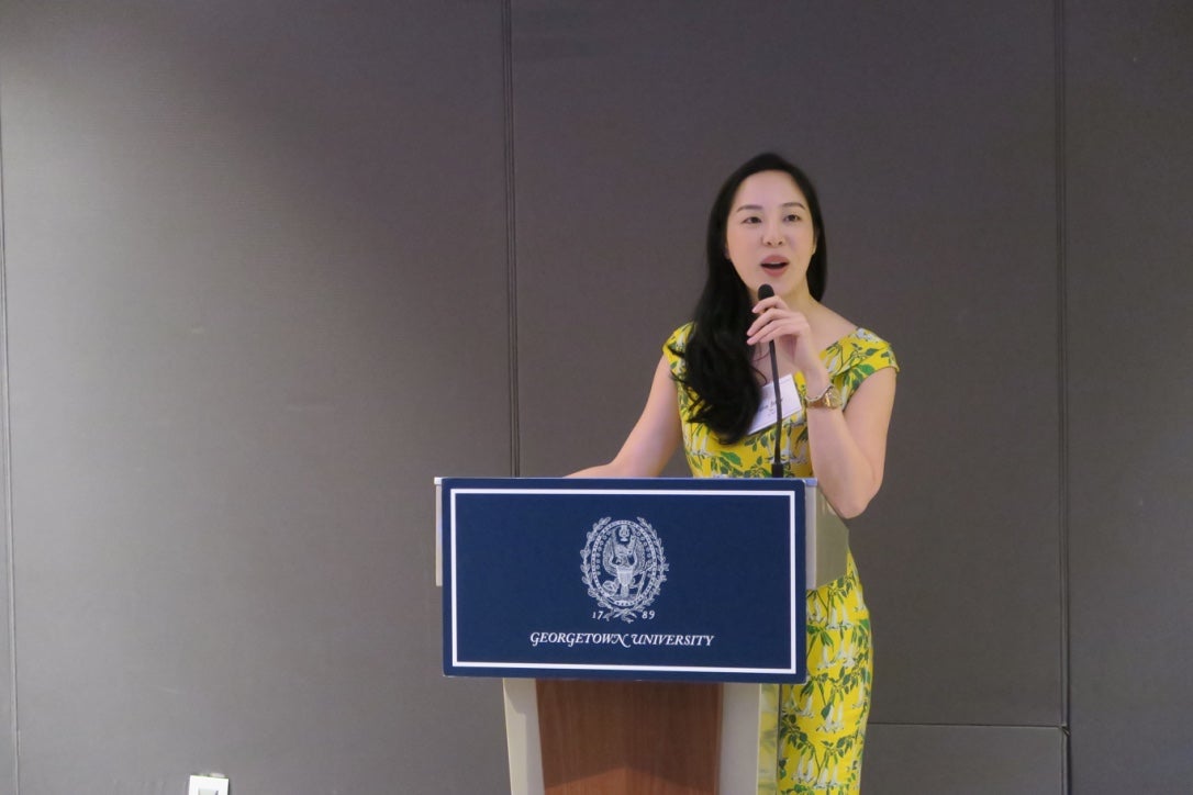 Sara Jane Ho (C'07), member of  Georgetown College's Board of Advisors, welcomes attendees as host for the  alumni reception in Shanghai.
